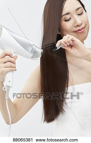 Young Japanese model with beautiful hair View Large Photo Image Stock Image - Young Japanese model with beautiful hair. Fotosearch