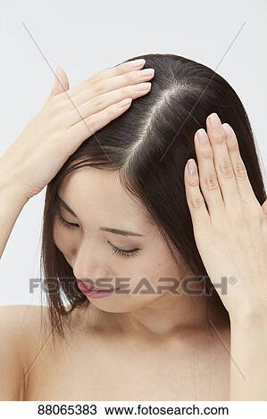 Young Japanese model with beautiful hair View Large Photo Image Stock Image - Young Japanese model with beautiful hair. Fotosearch