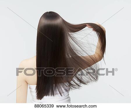 Young Japanese model with beautiful hair View Large Photo Image Stock Photo - Young Japanese model with beautiful hair. Fotosearch