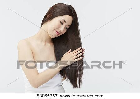 Stock Photo - Young Japanese model with beautiful hair. Fotosearch