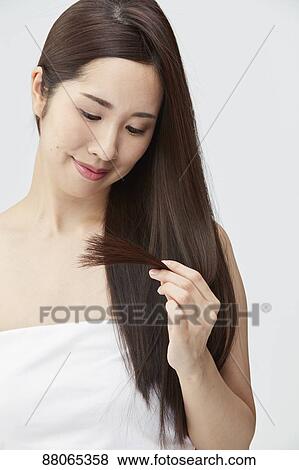 Young Japanese model with beautiful hair View Large Photo Image Stock Photo - Young Japanese model with beautiful hair. Fotosearch