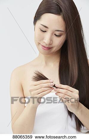 Stock Photo - Young Japanese model with beautiful hair. Fotosearch
