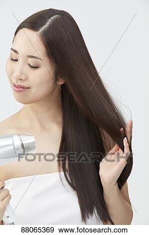 Young Japanese model with beautiful hair View Large Photo Image Stock Photo - Young Japanese model with beautiful hair. Fotosearch