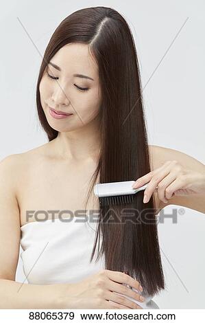 Young Japanese model with beautiful hair View Large Photo Image Stock Photo - Young Japanese model with beautiful hair. Fotosearch