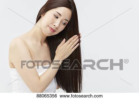 Young Japanese model with beautiful hair View Large Photo Image Stock Photograph - Young Japanese model with beautiful hair. Fotosearch