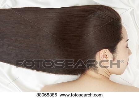 Young Japanese model with beautiful hair View Large Photo Image Stock Photograph - Young Japanese model with beautiful hair. Fotosearch