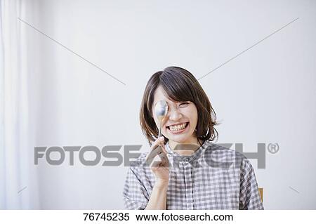 Young Japanese woman eating cake View Large Photo Image Stock Photography - Young Japanese woman eating cake. Fotosearch