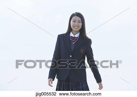 Young Japanese woman in a high school uniform by the sea, Chiba, Japan View Large Photo Image Stock Image - Young Japanese woman in a high school uniform by the sea, Chiba, Japan. Fotosearch