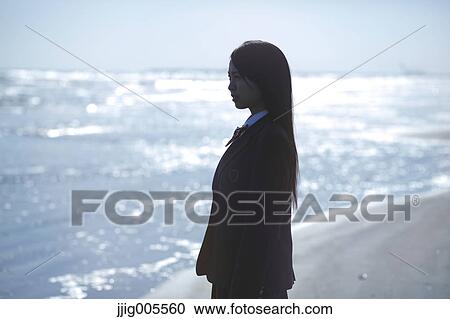 Young Japanese woman in a high school uniform by the sea, Chiba, Japan View Large Photo Image Stock Image - Young Japanese woman in a high school uniform by the sea, Chiba, Japan. Fotosearch
