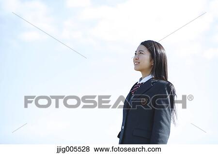 Young Japanese woman in a high school uniform by the sea, Chiba, Japan View Large Photo Image Stock Photo - Young Japanese woman in a high school uniform by the sea, Chiba, Japan. Fotosearch