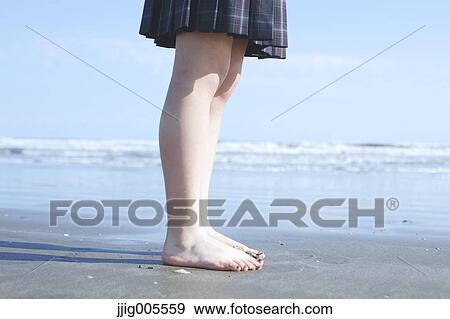 Young Japanese woman in a high school uniform by the sea, Chiba, Japan View Large Photo Image Stock Photo - Young Japanese woman in a high school uniform by the sea, Chiba, Japan. Fotosearch