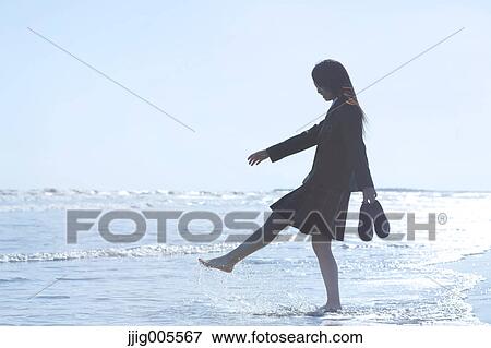 Young Japanese woman in a high school uniform by the sea, Chiba, Japan View Large Photo Image Stock Photo - Young Japanese woman in a high school uniform by the sea, Chiba, Japan. Fotosearch