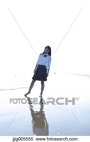 Young Japanese woman in a high school uniform by the sea, Chiba, Japan View Large Photo Image Stock Photography - Young Japanese woman in a high school uniform by the sea, Chiba, Japan. Fotosearch