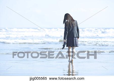 Young Japanese woman in a high school uniform by the sea, Chiba, Japan View Large Photo Image Stock Photography - Young Japanese woman in a high school uniform by the sea, Chiba, Japan. Fotosearch