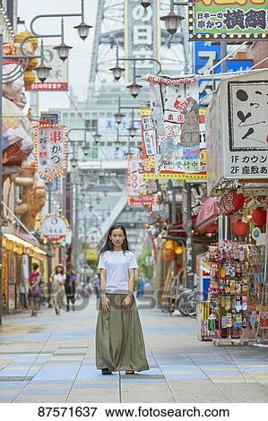 Stock Photo - Young Japanese woman in Osaka. Fotosearch