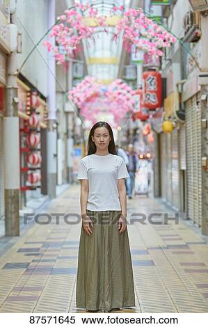 Stock Photography - Young Japanese woman in Osaka. Fotosearch