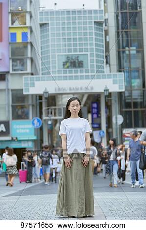 Stock Photography - Young Japanese woman in Osaka. Fotosearch