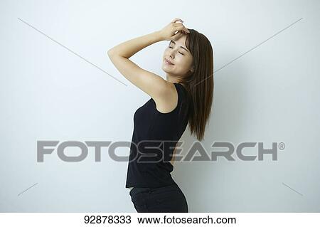 Stock Image - Attractive Japanese woman beauty portrait. Fotosearch