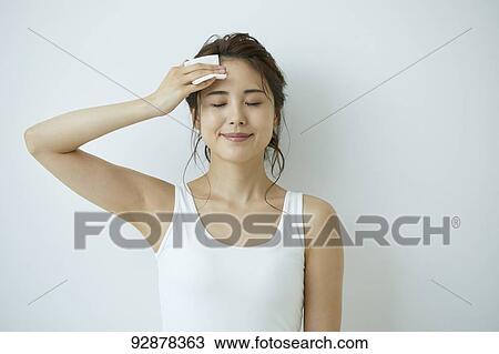 Stock Image - Attractive Japanese woman beauty portrait. Fotosearch