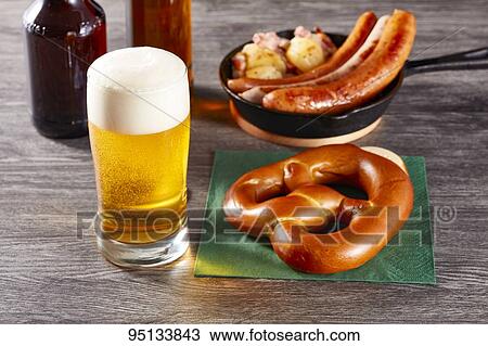 Stock Image - Beer and pretzel. Fotosearch