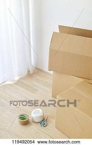 Cardboards in the house View Large Photo Image Picture - Cardboards in the house. Fotosearch
