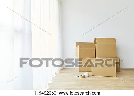 Cardboards in the house View Large Photo Image Stock Image - Cardboards in the house. Fotosearch
