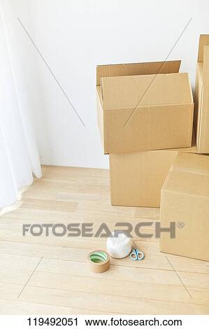 Cardboards in the house View Large Photo Image Stock Image - Cardboards in the house. Fotosearch