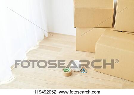 Cardboards in the house View Large Photo Image Stock Image - Cardboards in the house. Fotosearch