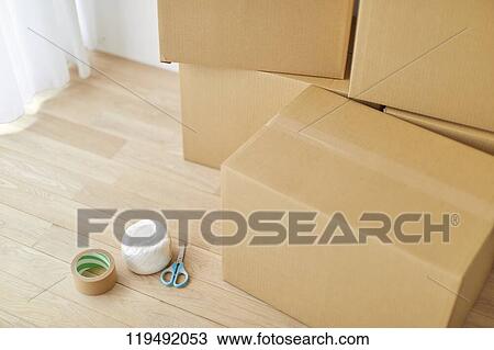 Cardboards in the house View Large Photo Image Stock Image - Cardboards in the house. Fotosearch