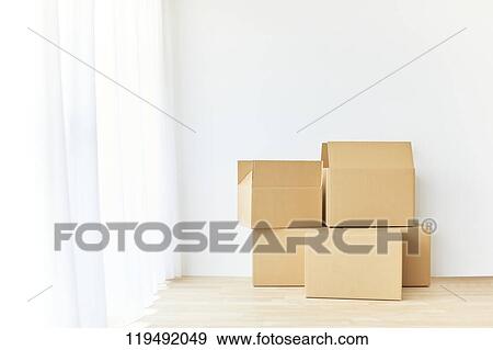 Cardboards in the house View Large Photo Image Stock Photo - Cardboards in the house. Fotosearch