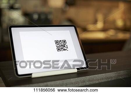Cashless payment at a restaurant View Large Photo Image Stock Photograph - Cashless payment at a restaurant. Fotosearch