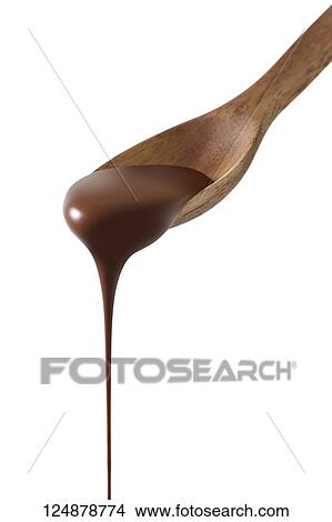 Picture - Chocolate pouring from spoon. Fotosearch