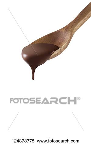 Stock Photography - Chocolate pouring from spoon. Fotosearch