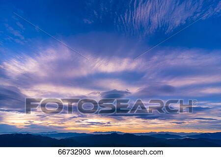Dramatic sunrise clouds View Large Photo Image Stock Image - Dramatic sunrise clouds. Fotosearch