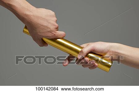 Picture - Hands holding baton. Fotosearch