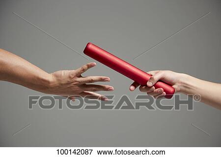 Hands holding baton View Large Photo Image Stock Photo - Hands holding baton. Fotosearch