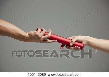 Hands holding baton View Large Photo Image Stock Photo - Hands holding baton. Fotosearch