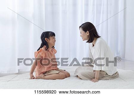 Stock Image - Happy Japanese family. Fotosearch