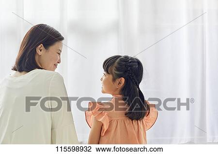 Stock Image - Happy Japanese family. Fotosearch