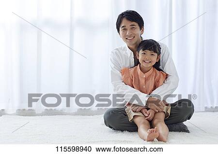 Stock Image - Happy Japanese family. Fotosearch