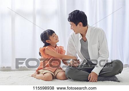 Stock Photo - Happy Japanese family. Fotosearch