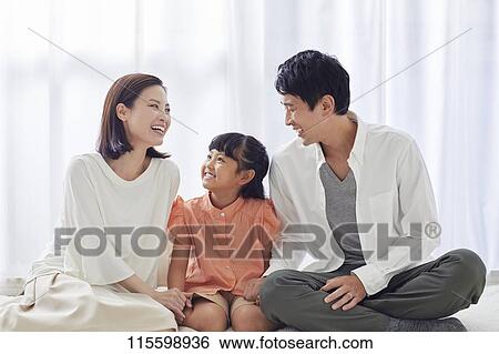 Happy Japanese family View Large Photo Image Stock Photograph - Happy Japanese family. Fotosearch
