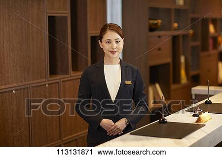 Stock Image - Hotel concierge. Fotosearch