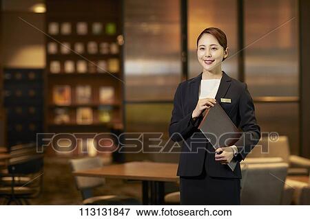 Stock Photo - Hotel concierge. Fotosearch