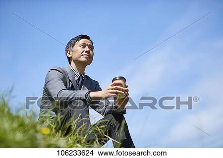 Japanese businessman downtown View Large Photo Image Picture - Japanese businessman downtown. Fotosearch