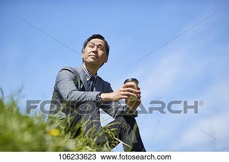 Japanese businessman downtown View Large Photo Image Stock Image - Japanese businessman downtown. Fotosearch