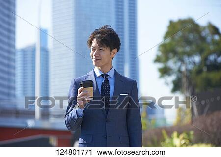 Japanese businessman downtown View Large Photo Image Stock Image - Japanese businessman downtown. Fotosearch