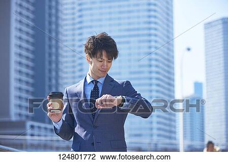 Japanese businessman downtown View Large Photo Image Stock Image - Japanese businessman downtown. Fotosearch