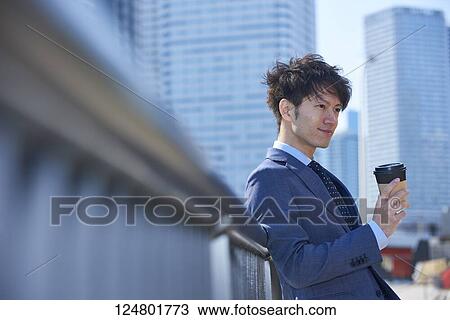 Japanese businessman downtown View Large Photo Image Stock Image - Japanese businessman downtown. Fotosearch