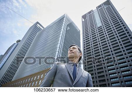 Japanese businessman downtown View Large Photo Image Stock Photo - Japanese businessman downtown. Fotosearch